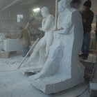 The plaster model next to its early shaped marble block